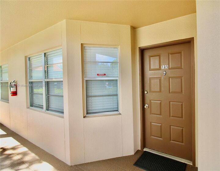 Property Photo: 1200 SW 125th Ave 105L FL 33027