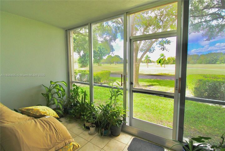 Property Photo:  1200 SW 125th Ave 105L  FL 33027 