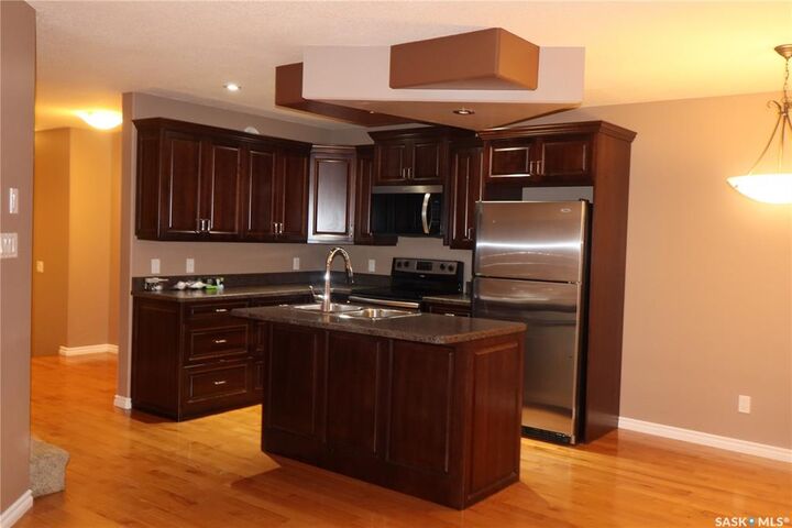 Property Photo: 33 Wood Lily Drive D2 SK S6J 1E4
