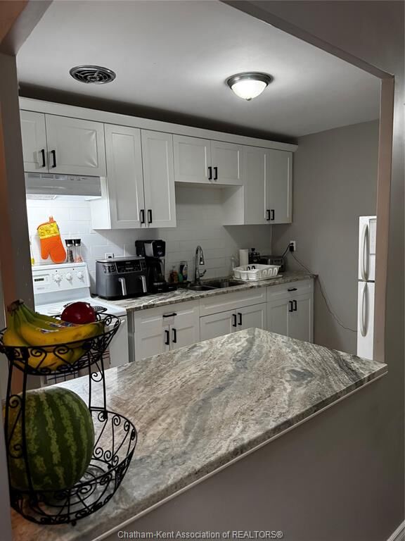 Property Photo: 63 Baldoon Road 206 ON N7L 1E2