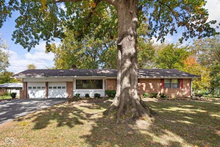 Property Photo:  4210 Kessler Lane East Drive  IN 46220