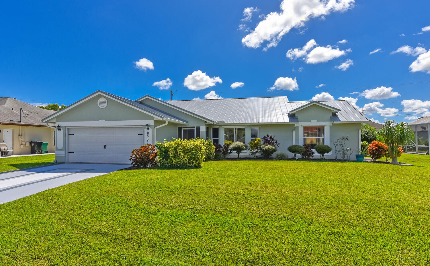 Property Photo:  6831 NW Hogate Circle  FL 34983 