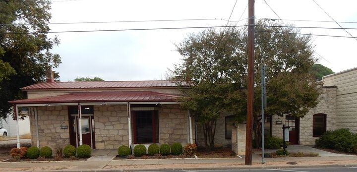 Property Photo: 408-410 Main St TX 78624