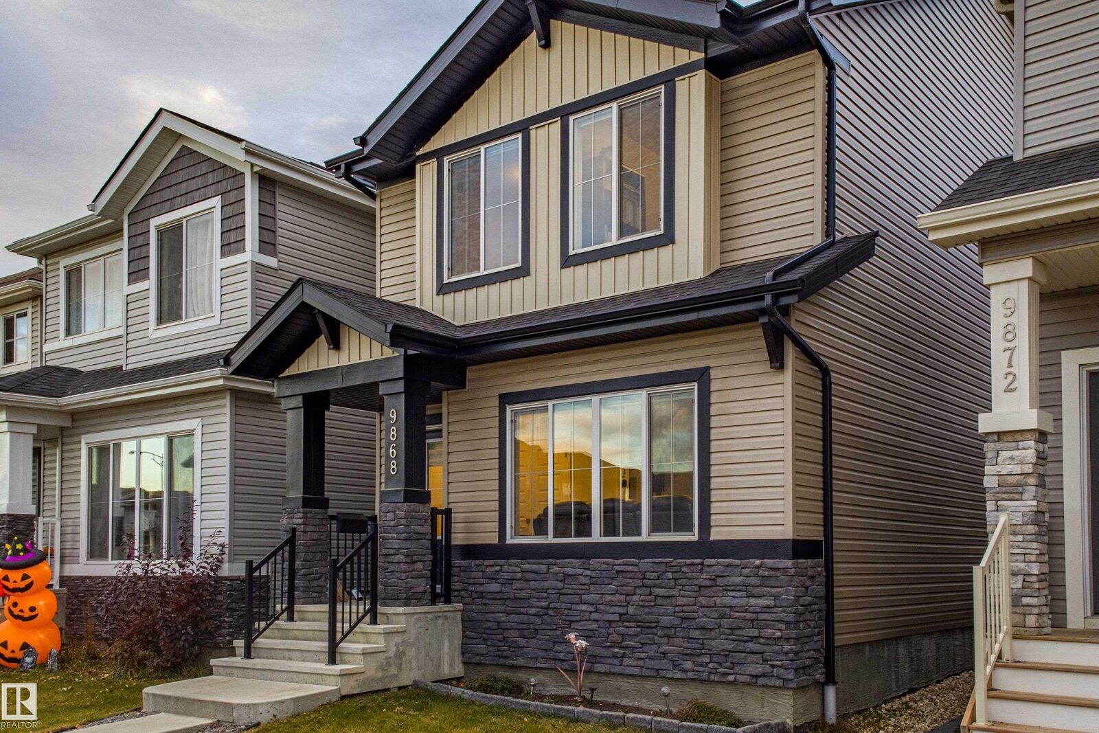 Property Photo:  9868 206 Street NW  AB T5T 7L5