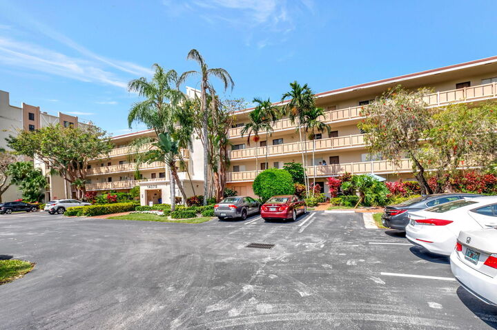 Property Photo:  14375 Strathmore Lane 305  FL 33446