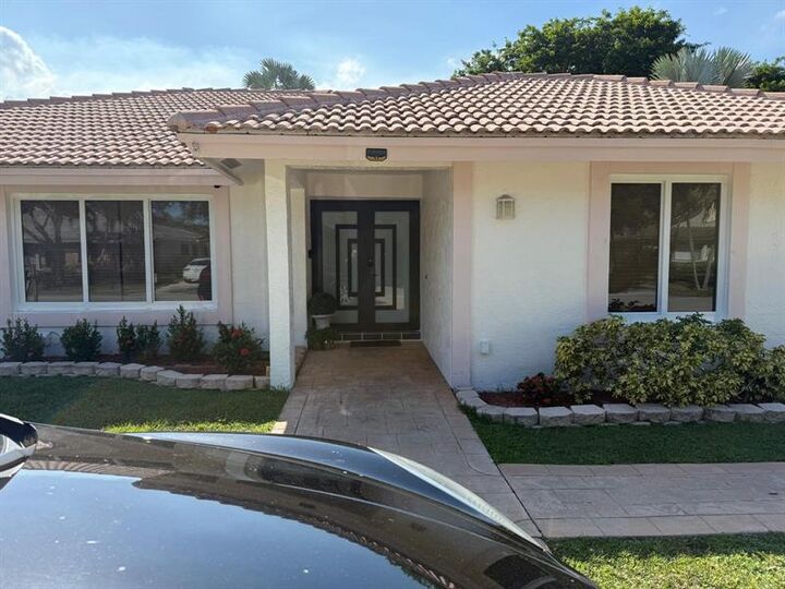 Property Photo:  402 NW 107th Ave  FL 33071 