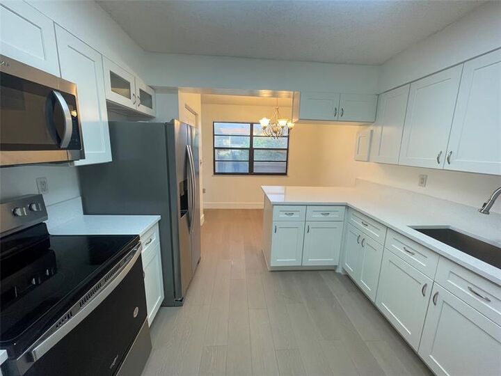 Property Photo:  1470 W 41st St 201  FL 33012