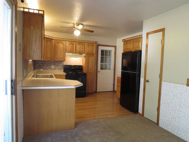 Property Photo:  405 Parkway Court  MI 48624