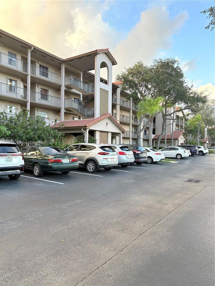 Property Photo:  1300 SW 124th Ter 304P  FL 33027