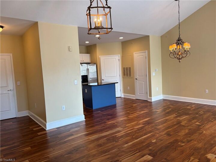 Property Photo: 6815 Hanesbrook Circle 304 NC 27012-9402