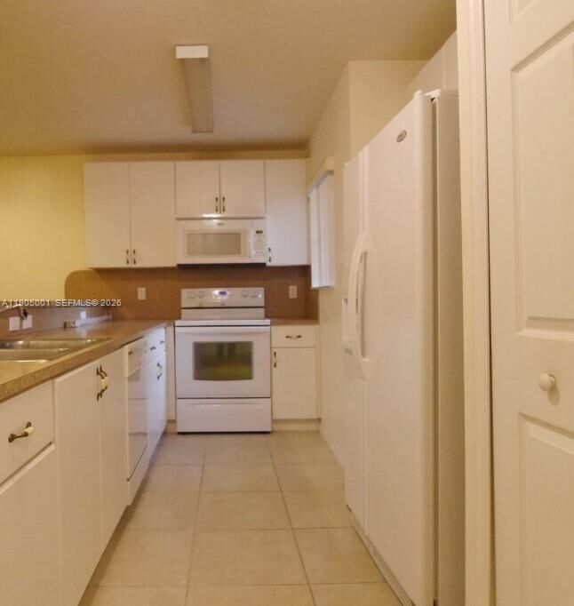 Property Photo:  22911 SW 88th Pl 5-21  FL 33190 