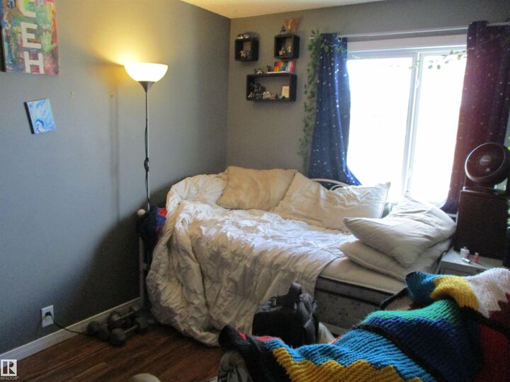 Property Photo:  13833 30 Street NW 67  AB T5Y 2B2 