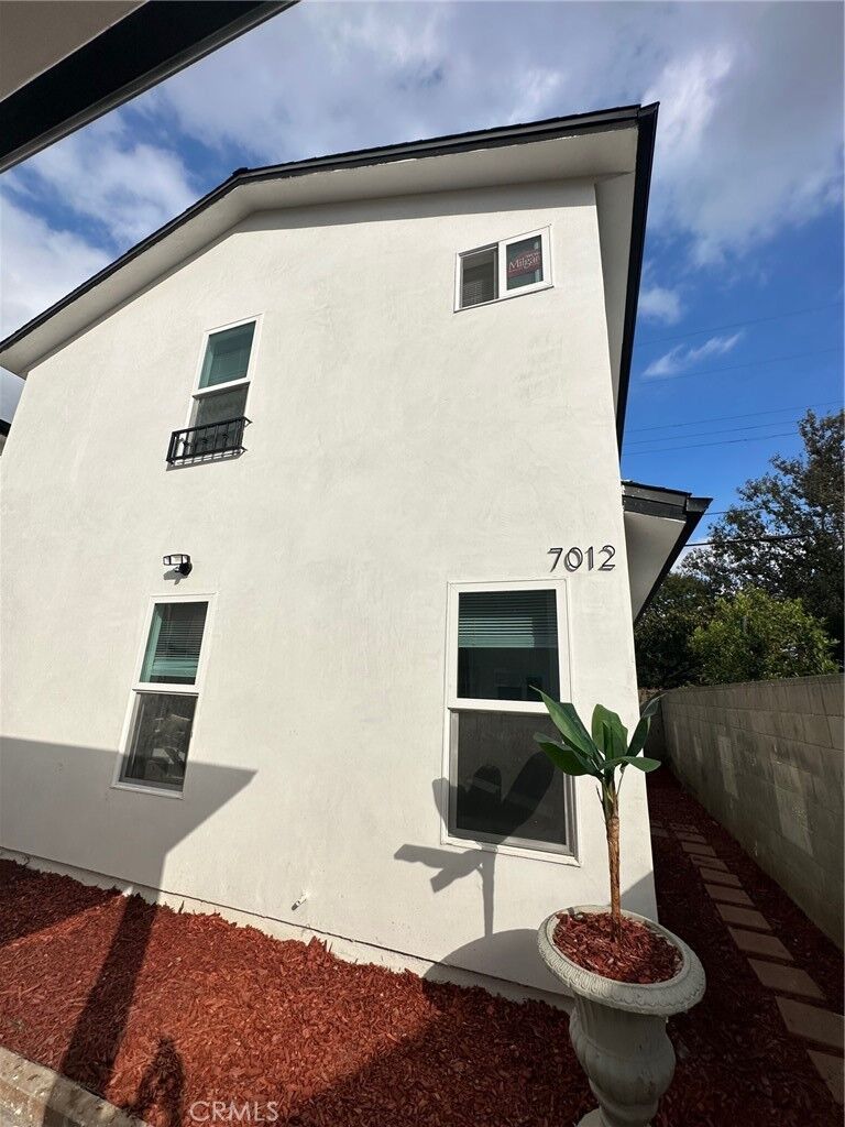 Property Photo:  7012 Bertrand Avenue  CA 91335 