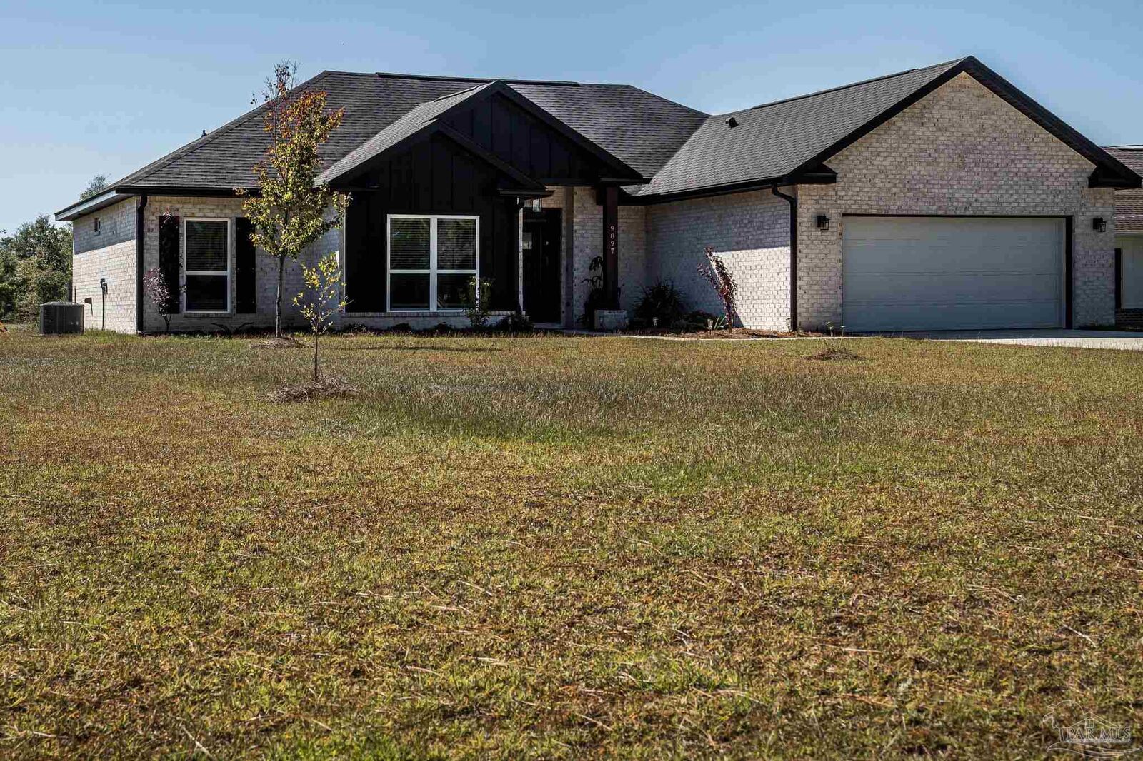 Property Photo: 9897 Shangri La West Rd FL 32583