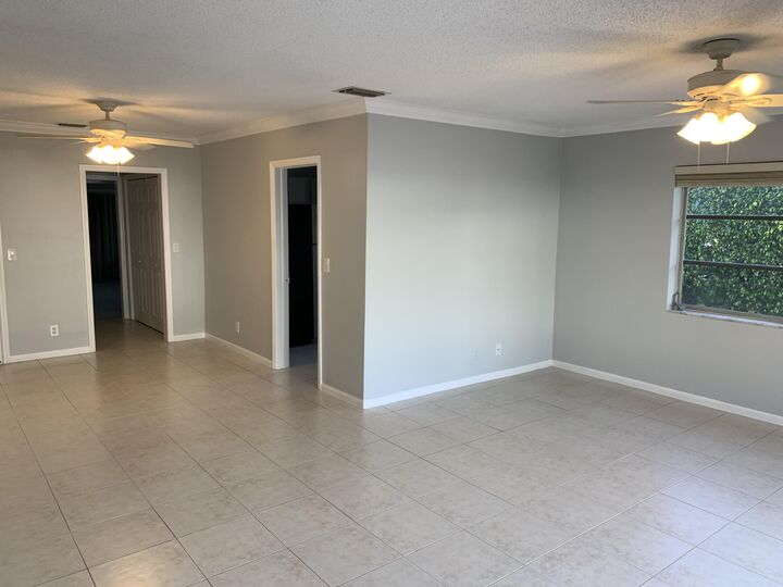 Property Photo: 6551 NE 7th Avenue B FL 33487
