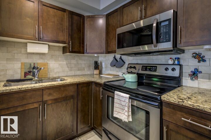 Property Photo: 2035 Grantham Court NW 322 AB T5T 3X4