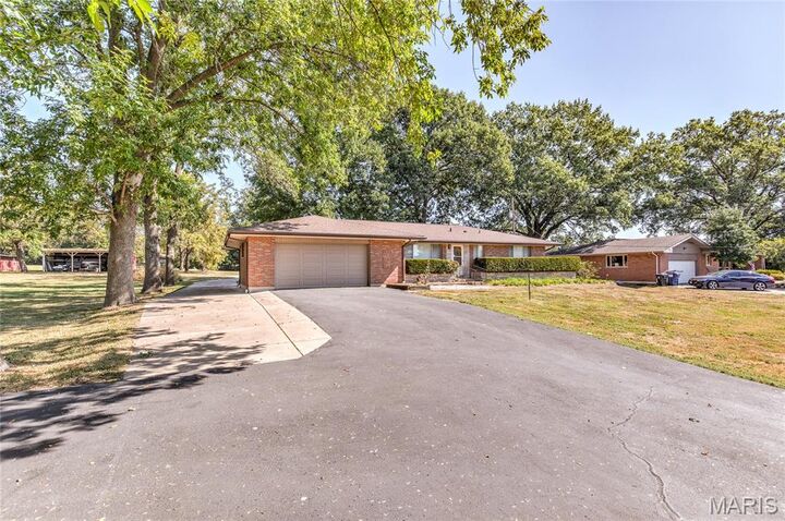 Property Photo:  2395 Charbonier Road  MO 63031 