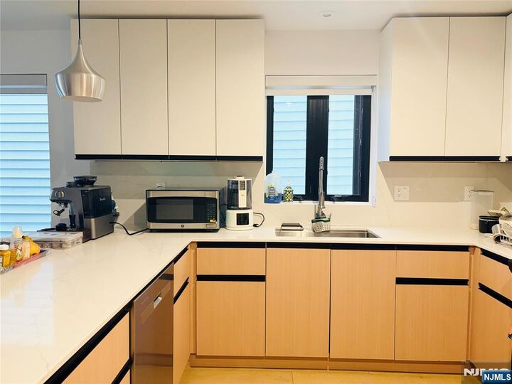 Property Photo:  211 70th 1  NJ 07093 