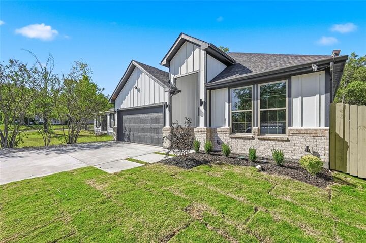 Property Photo:  805 NE 31  TX 75050 