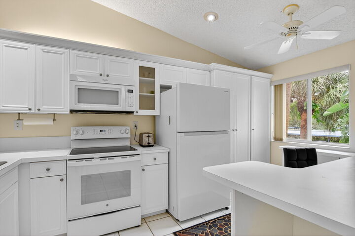 Property Photo:  380 NW 67th Street 207  FL 33487 