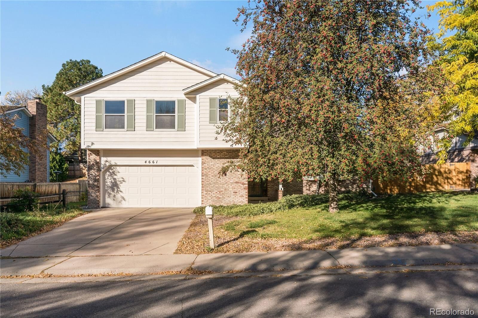 Property Photo: 4661 S Wolff Street CO 80236