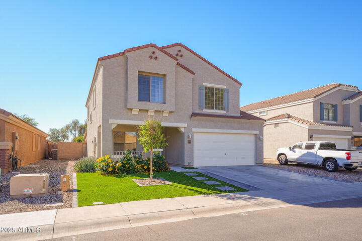 Property Photo: 23685 W Grove Street AZ 85326