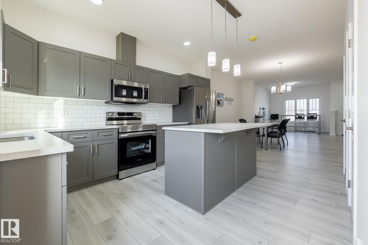 Property Photo: 303 27 Street SW AB T6X 3H9