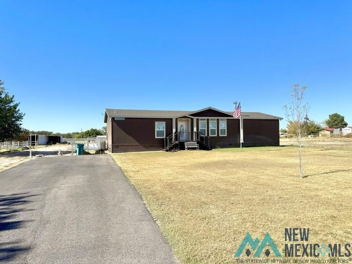 Property Photo: 1411 Tokay Avenue NM 88220