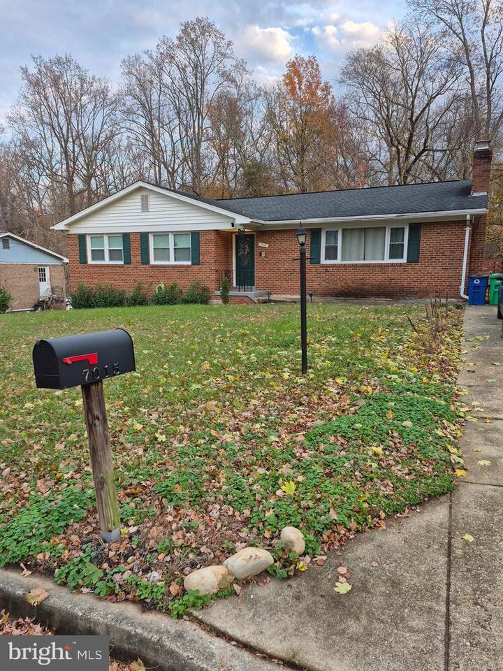 Property Photo:  7015 Groveton Drive  MD 20735 