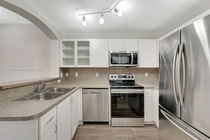 Property Photo: 6141 NW 115th Pl 352 FL 33178