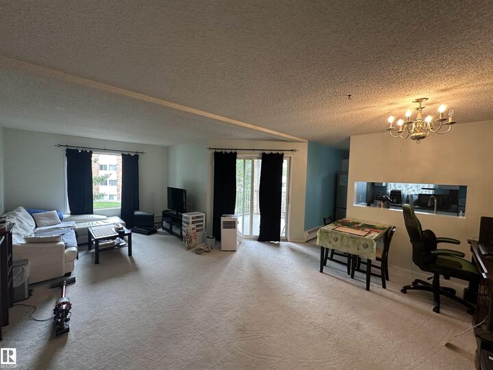 Property Photo:  17109 67 Ave NW 318  AB T5T 6E6 