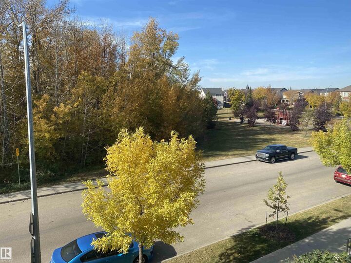 Property Photo:  9535 217 Street NW 114  AB T5T 4P5 