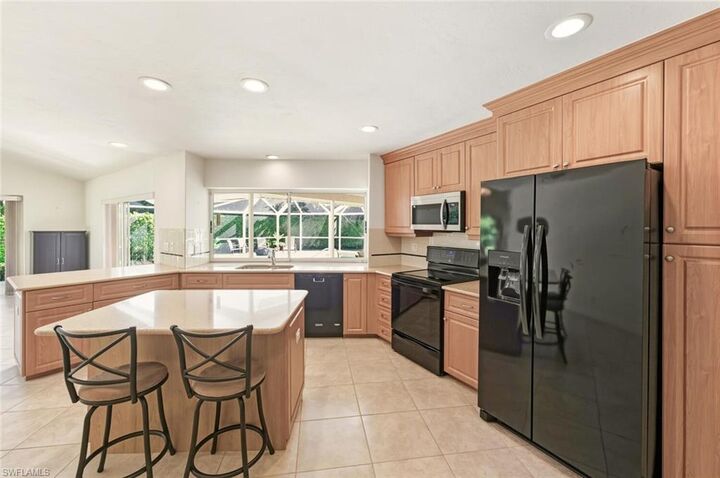 Property Photo:  306 Belville Blvd  FL 34104 