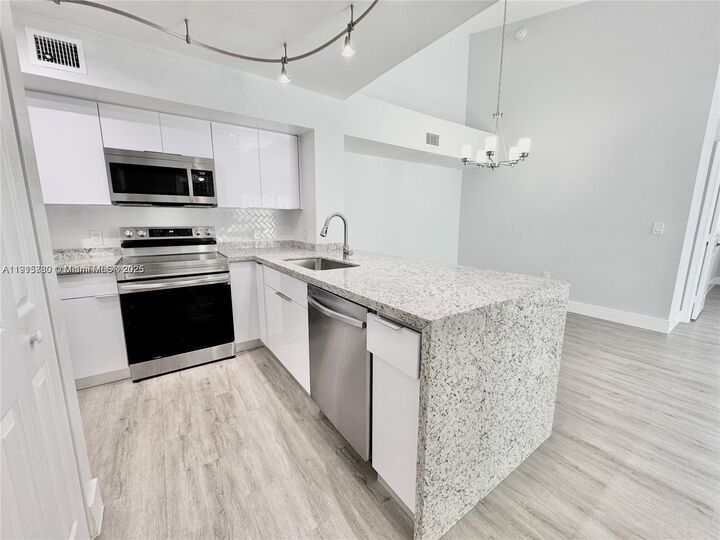 Property Photo:  677 SW 111th Ave 303  FL 33025 