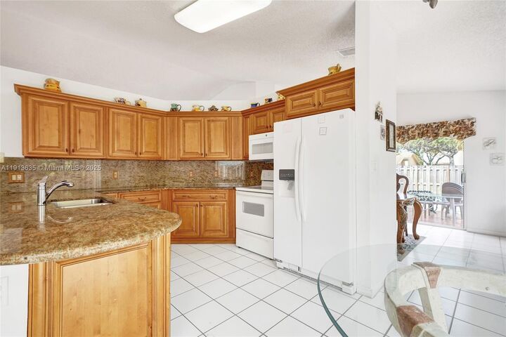 Property Photo:  8007 SW 157th Pl  FL 33193 