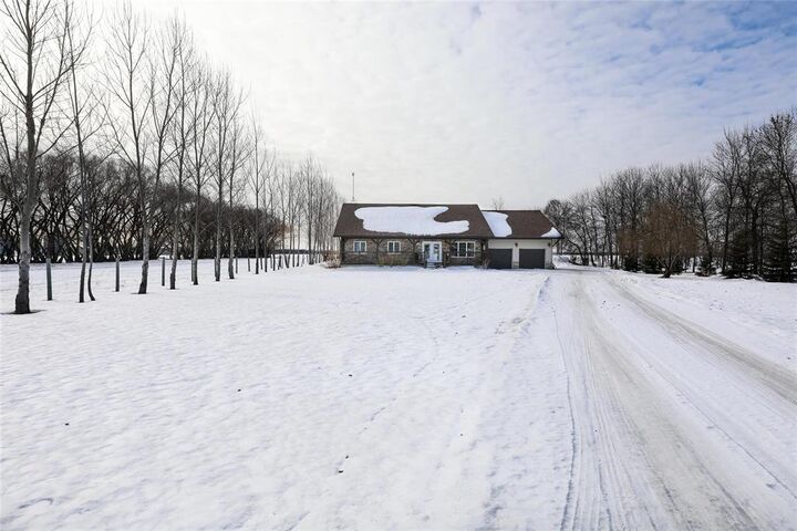 Property Photo:  21062 33 Road East  MB R0A 1X0 
