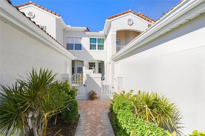 Property Photo:  8410 Excalibur Circle A7  FL 34108 