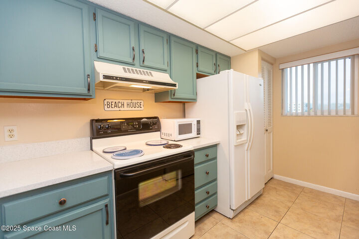 Property Photo:  1595 N Atlantic Avenue  FL 32931 