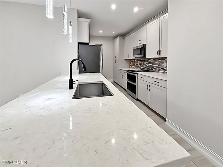 Property Photo:  7324 Rockefeller Drive  FL 34119 