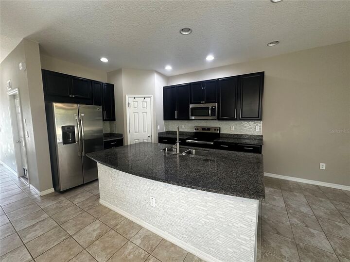 Property Photo: 6911 Woodchase Glen Drive FL 33578