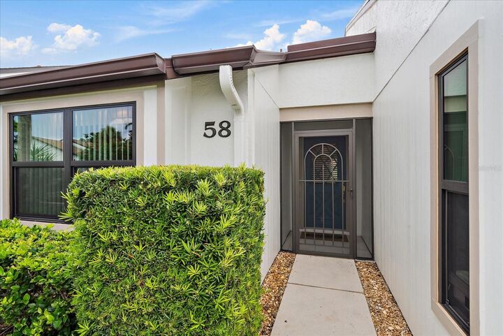 Property Photo:  1211 Capri Isles Boulevard 58  FL 34292 