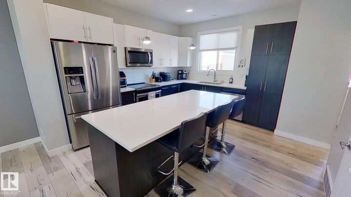 Property Photo:  9876 206 Street NW  AB T5T 7L5 