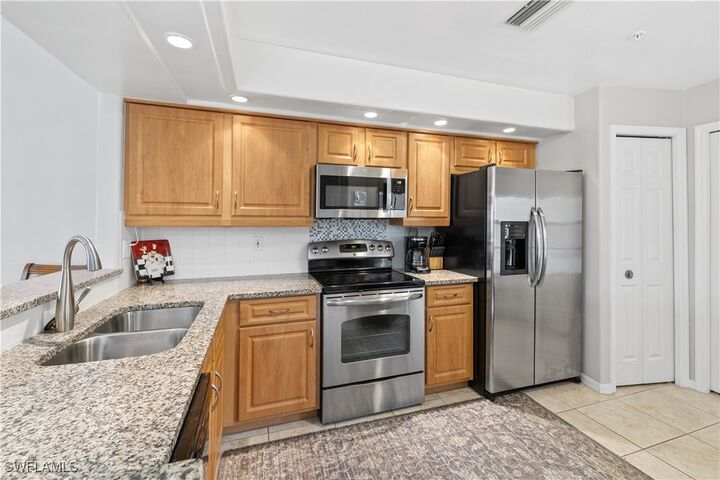 Property Photo: 13010 Amberley Court 205 FL 34135