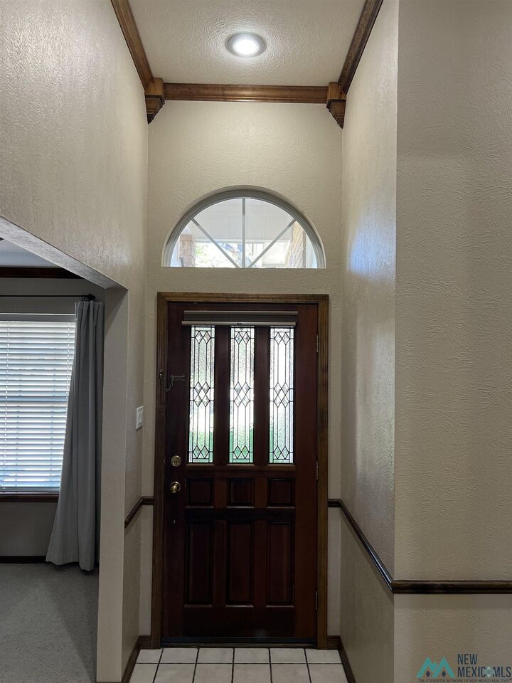 Property Photo: 409 Chanticleer Place NM 88101