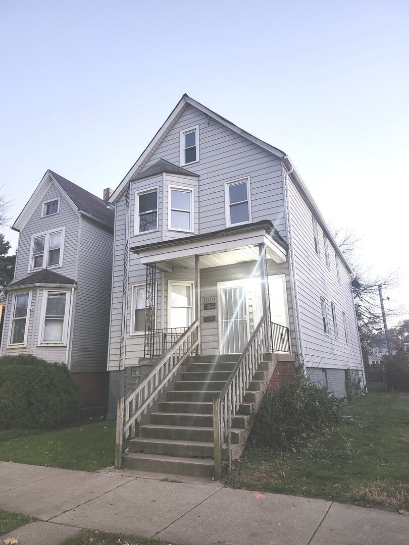 Property Photo: 3019 E 80th Street 1 IL 60617