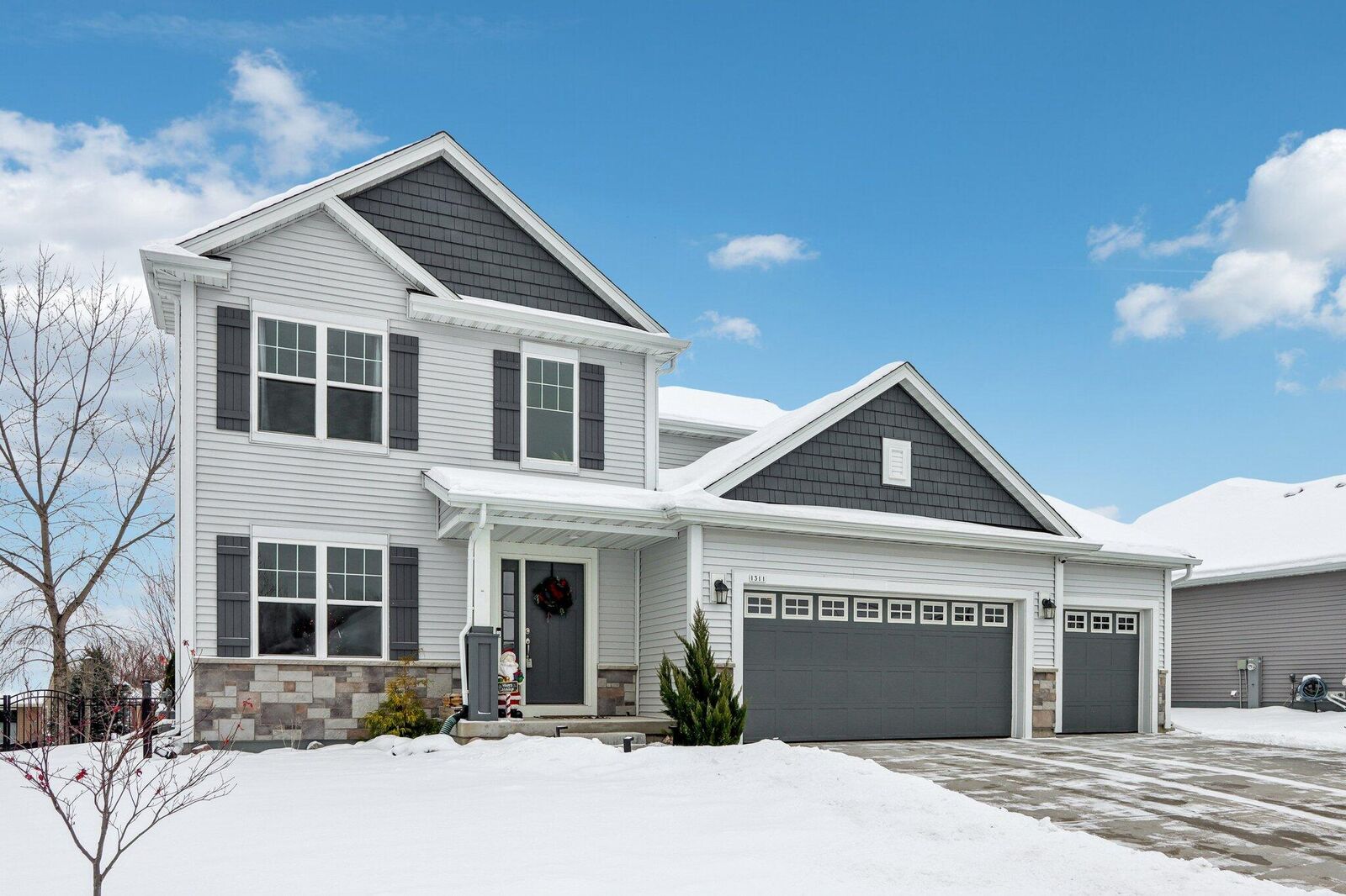 Property Photo: 1311 Daisy Dr WI 53090