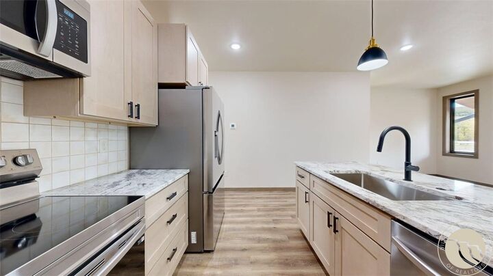 Property Photo: 1125 Adams Ave S. 6 MT 59068