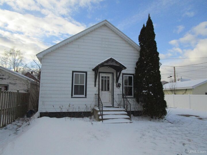 Property Photo: 308/310 S 12th Street MI 49829