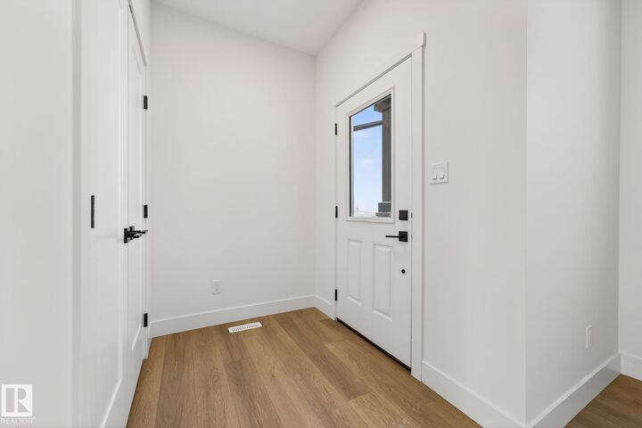 Property Photo:  10241 92A Avenue  AB T8R 1A0 