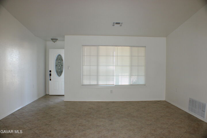 Property Photo:  8472 Viburnum Avenue  CA 93505 